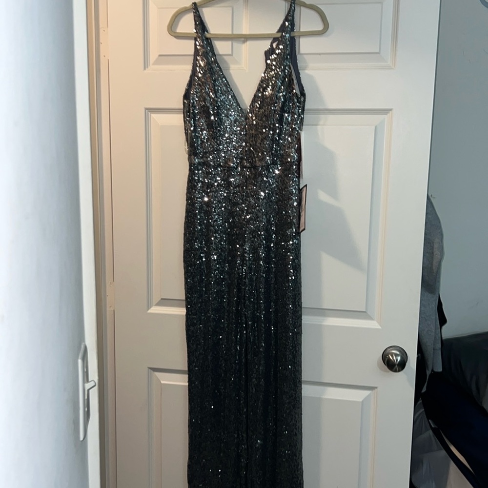 Sequin pant legs body suit.